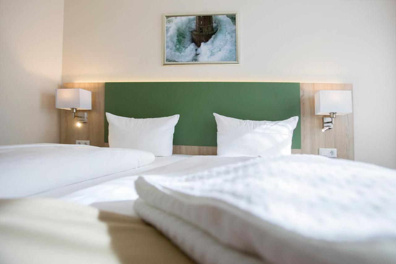 Nordsee-Hotel Hinrichsen ฮูซุม ภายนอก รูปภาพ