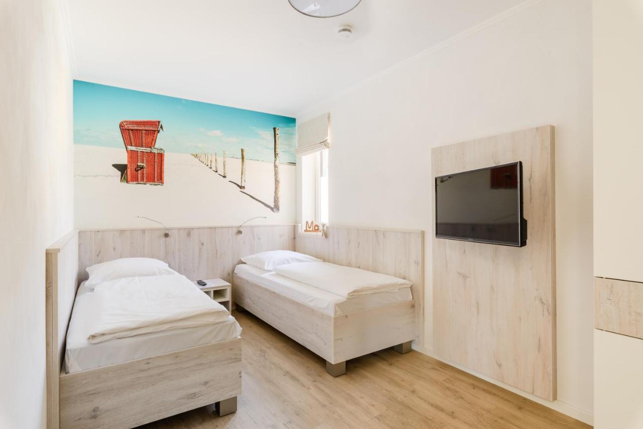 Nordsee-Hotel Hinrichsen ฮูซุม ภายนอก รูปภาพ